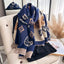 Alt Tag: raw hem polyester scarf in navy and beige with heart pattern, draped on a chair for stylish cold-weather layering