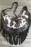 Fame Cow Print Faux Leather Fringe Hobo Bag