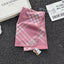 Alt Tag: classic plaid scarf pink checkered polyester fiber 1-piece imported winter accessory flat lay