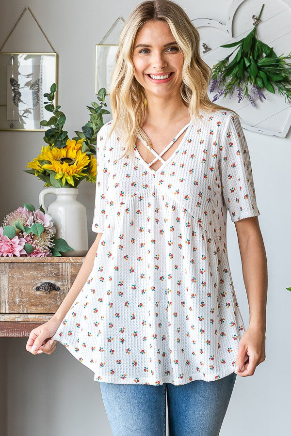 Heimish Full Size Crisscross Ditsy Floral Babydoll Top Plus Size - felvior