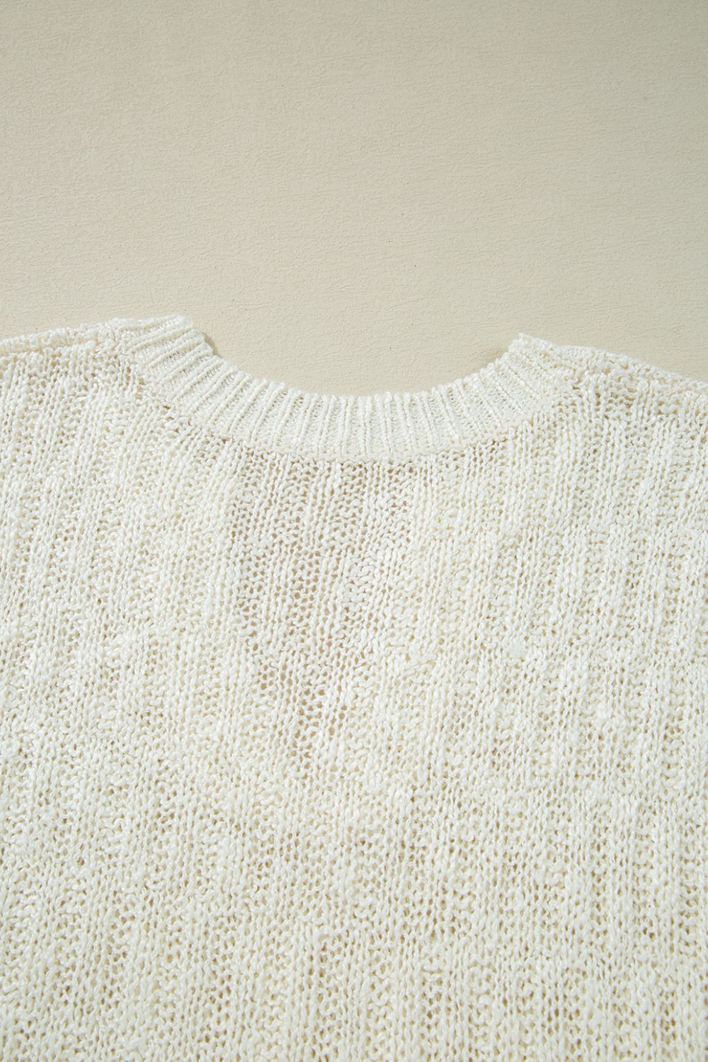 Notched Cap Sleeve Knit Top