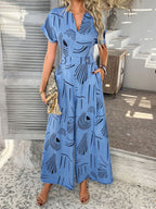 Devine Printed Notched Short Sleeve Wide Leg Jumpsuit