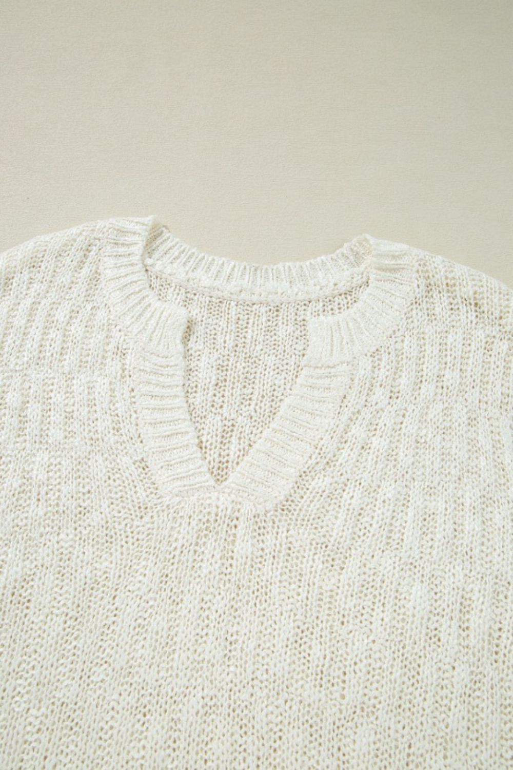 Notched Cap Sleeve Knit Top