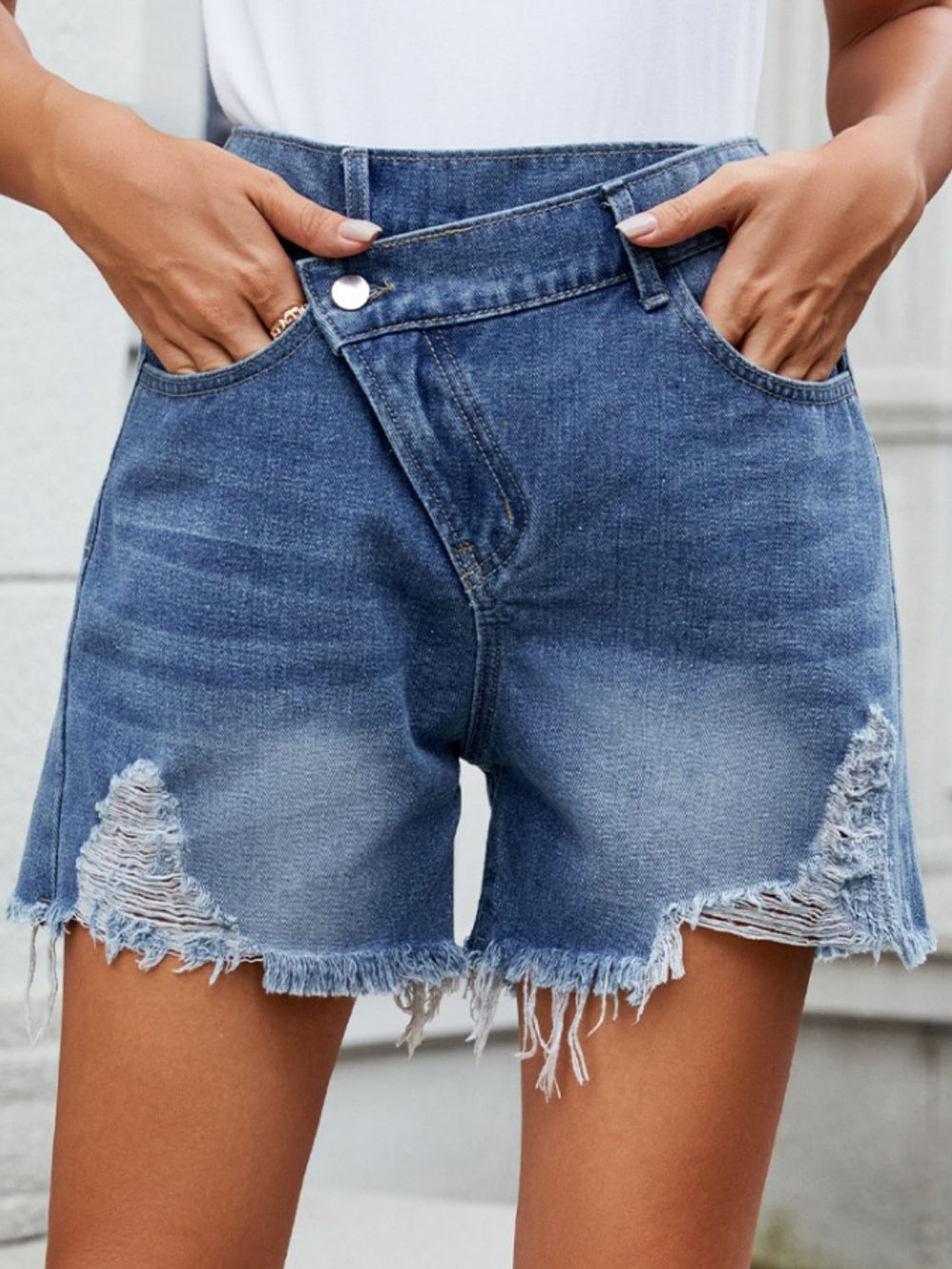 Distressed Raw Hem Asymmetric Waist Denim Shorts - felvior
