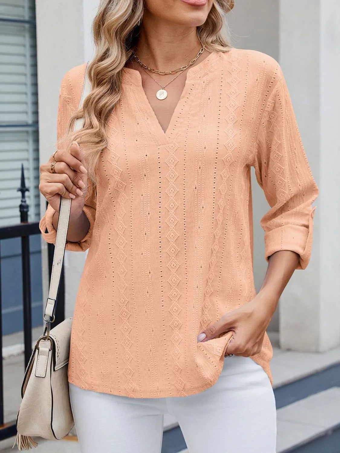 Eyelet Notched Roll-Tab Sleeve Top
