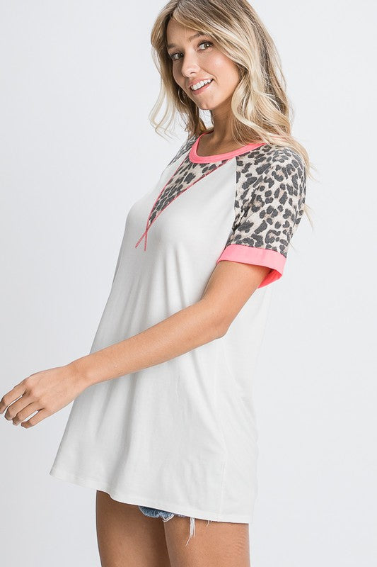 HeimishFull Size Leopard Round Neck Short Sleeve T-Shirt with Stitch Plus Size