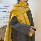 classic plaid scarf in yellow and white, oversized wrap style, polyester fiber, worn over gray coat