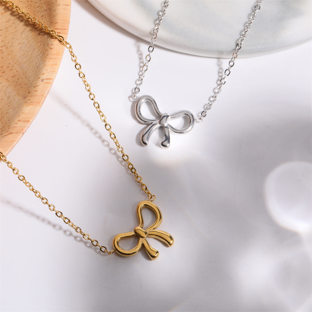 Titanium Steel Bow Pendant Necklace - felvior
