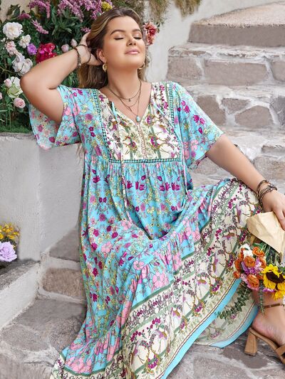 Plus Size Printed Tie Neck Flutter Sleeve Maxi Dress