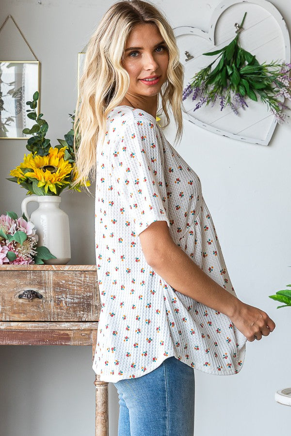 Heimish Full Size Crisscross Ditsy Floral Babydoll Top Plus Size - felvior