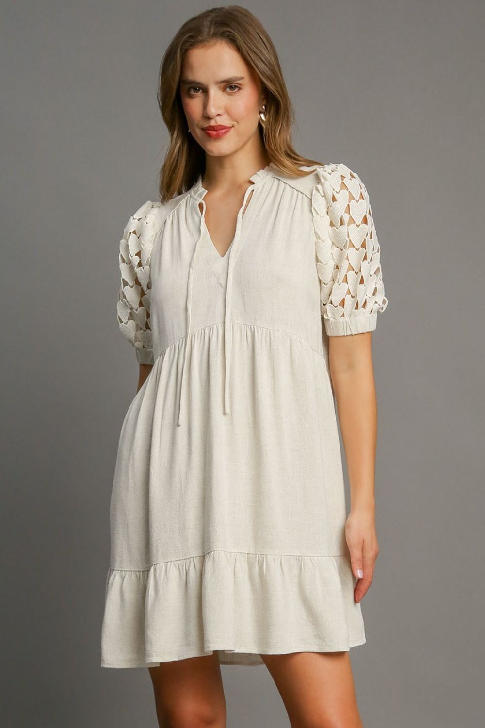 Umgee Full Size Ruffled Hem Heart Lace Sleeve Tie Neck Dress Plus Size Image principale du produit