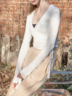 Tied Surplice Long Sleeve Top