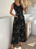 Devine Printed Round Neck Sleeveless Tie Waist Jumpsuit