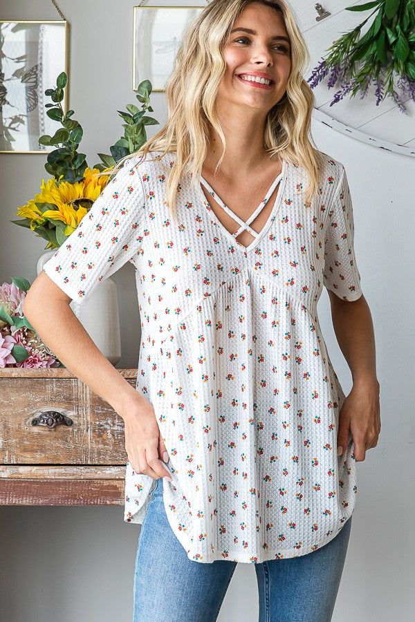 Heimish Full Size Crisscross Ditsy Floral Babydoll Top Plus Size - felvior