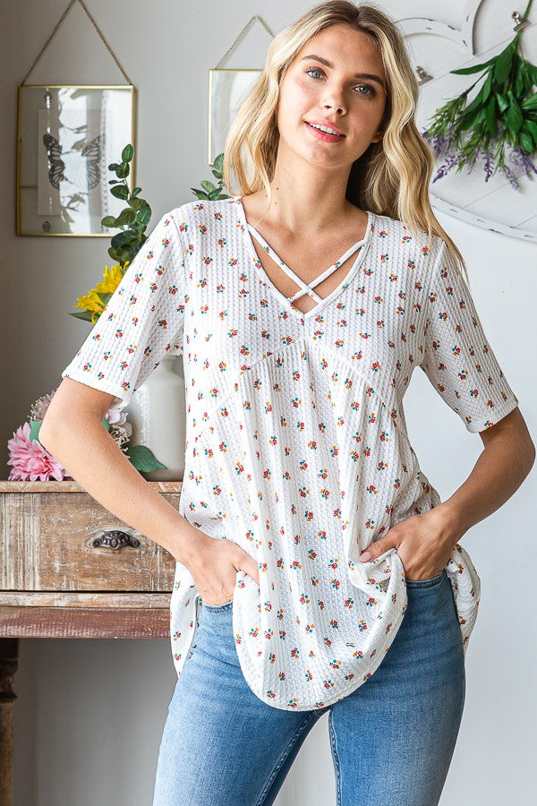 Heimish Full Size Crisscross Ditsy Floral Babydoll Top Plus Size - felvior