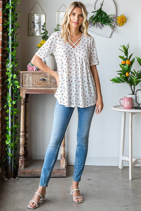 Heimish Full Size Crisscross Ditsy Floral Babydoll Top Plus Size - felvior