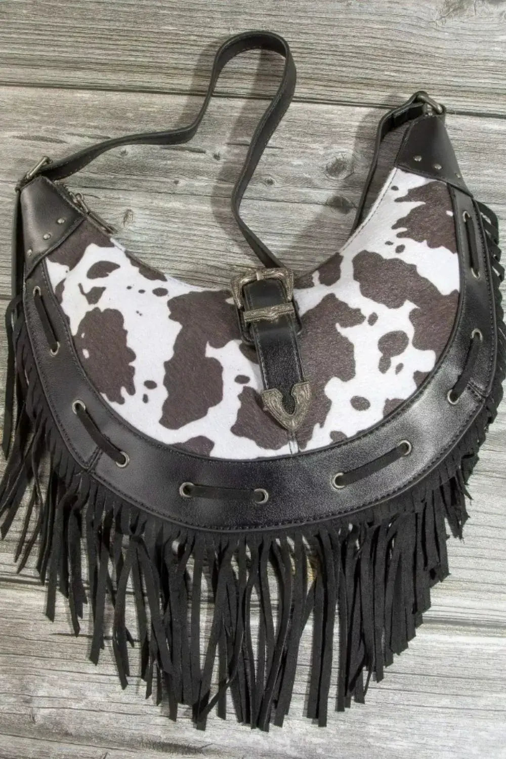 Fame Cow Print Faux Leather Fringe Hobo Bag