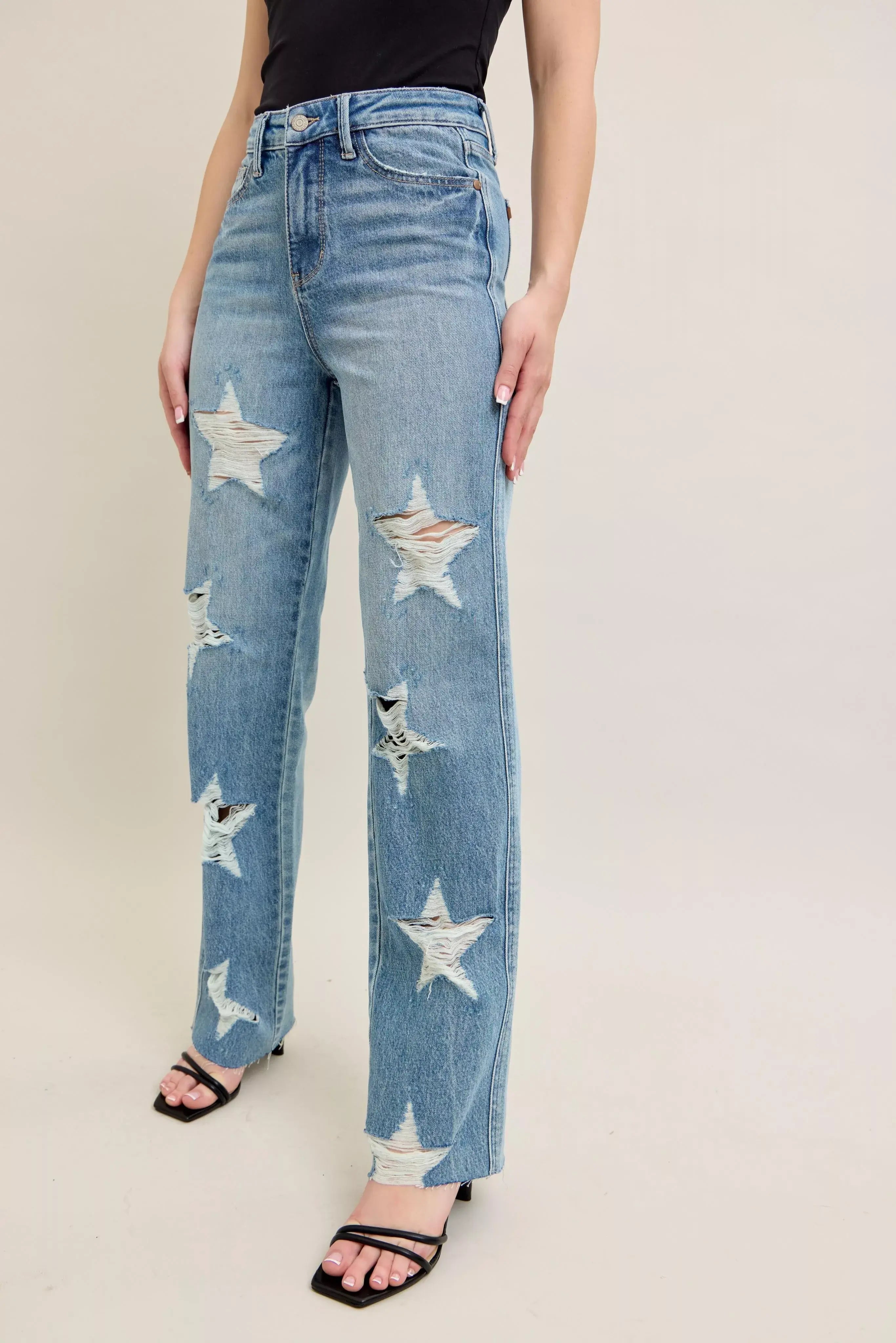 plus size 90s high waist jeans with star-shaped destroy details, straight leg fit, retro-inspired style, flattering silhouette, trendy fashion