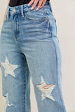 Close-up of plus size 90s high waist jeans with star-shaped destroy details and a trendy retro design.