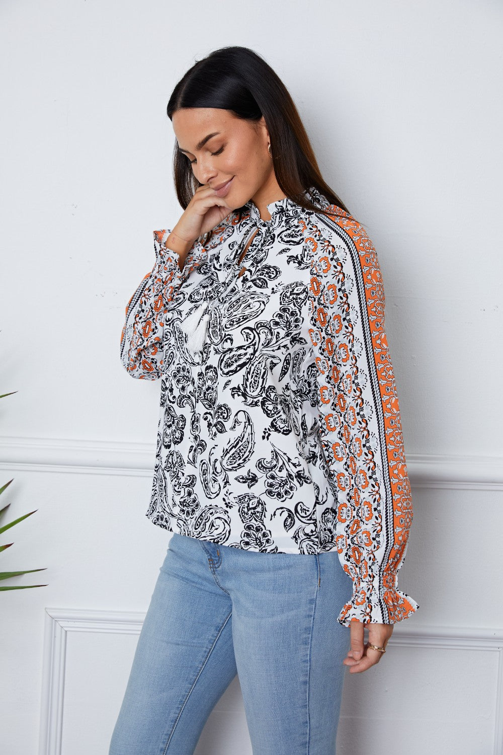 Tassel Tie Neck Printed Smocked Long Sleeve Blouse - felvior