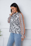 Tassel Tie Neck Printed Smocked Long Sleeve Blouse - felvior