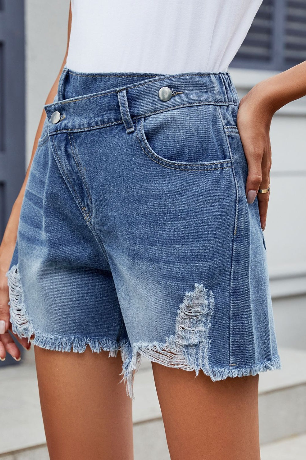 Distressed Raw Hem Asymmetric Waist Denim Shorts - felvior