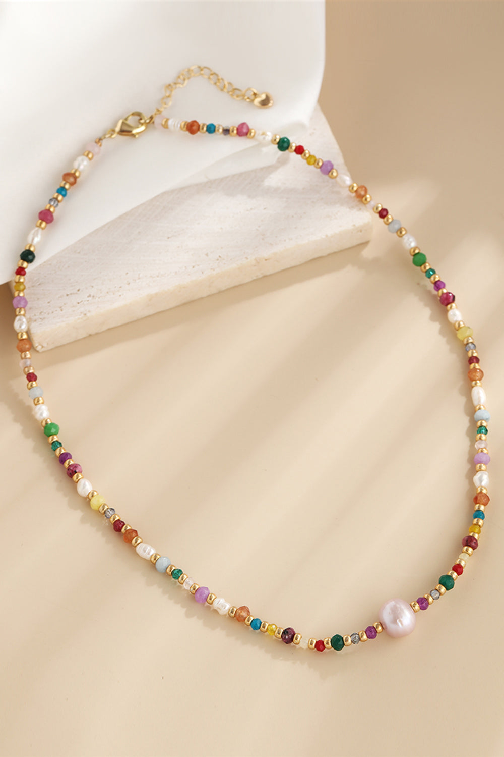 multicolored bead necklace with freshwater pearls featuring crystal and colorful beads with gold clasp