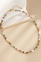 multicolored bead necklace with freshwater pearls featuring crystal and colorful beads with gold clasp