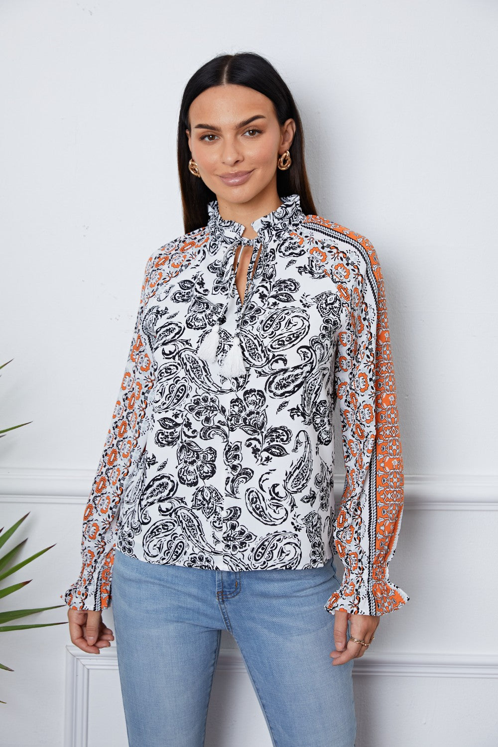 Tassel Tie Neck Printed Smocked Long Sleeve Blouse - felvior