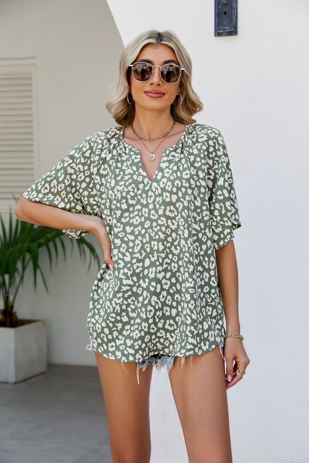 Leopard Notched Half Sleeve Blouse - felvior