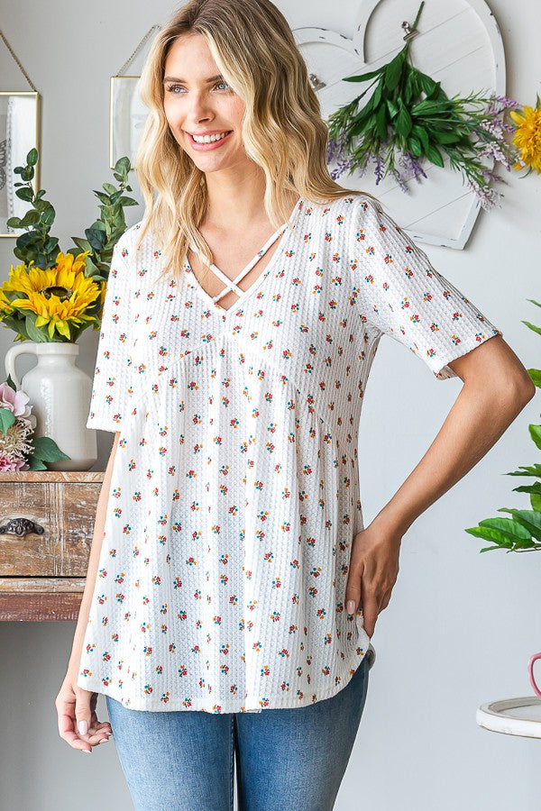 Heimish Full Size Crisscross Ditsy Floral Babydoll Top Plus Size - felvior