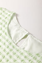 Textured Short Sleeve Tiered Mini Dress