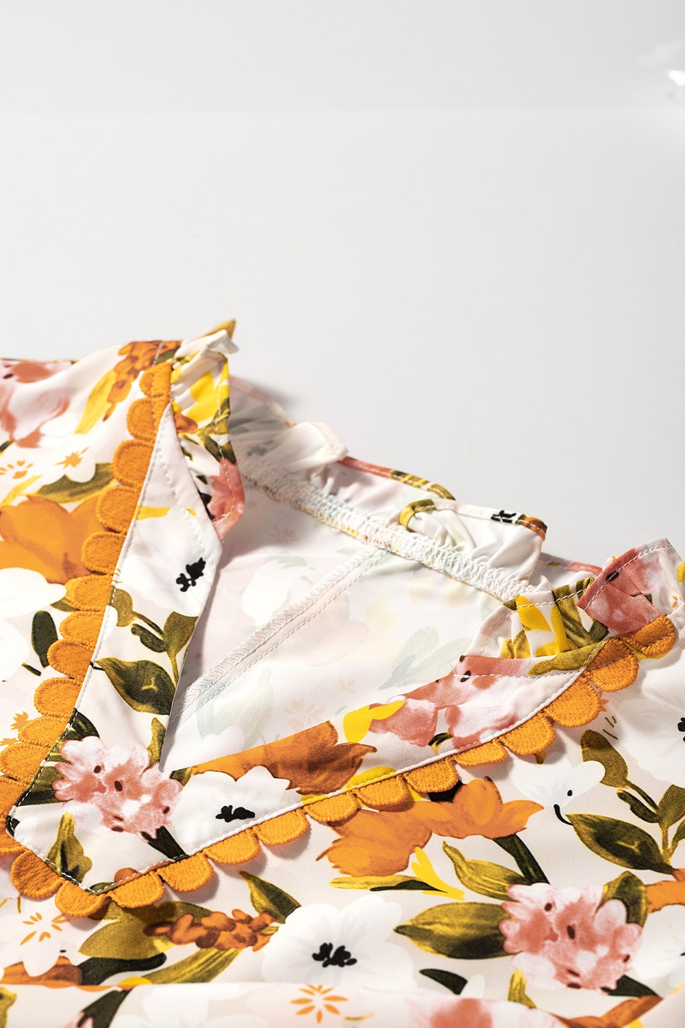 Ruffled Notched Short Sleeve Floral Blouse - felvior