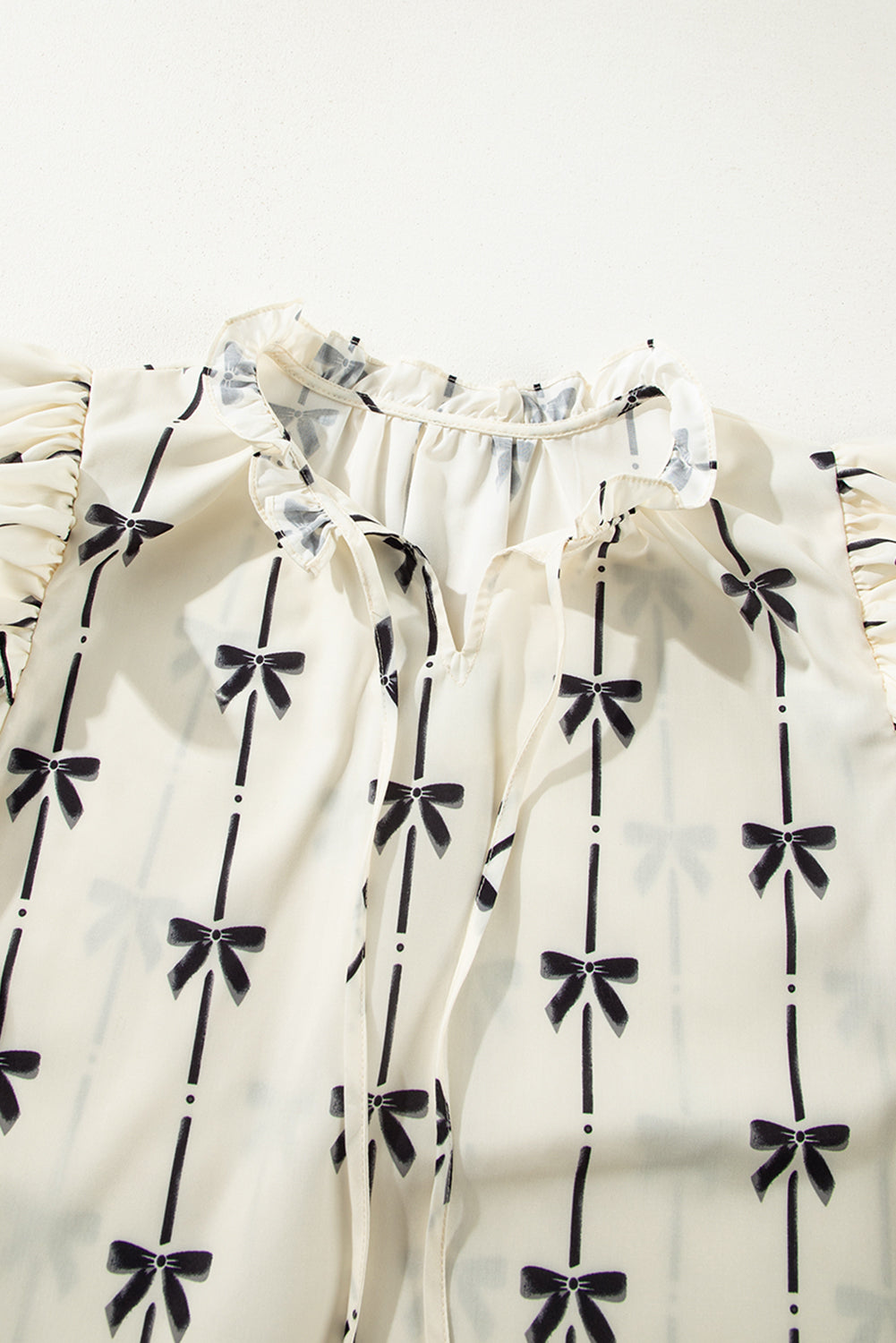 Bow Print Tie Neck Short Sleeve Blouse - felvior