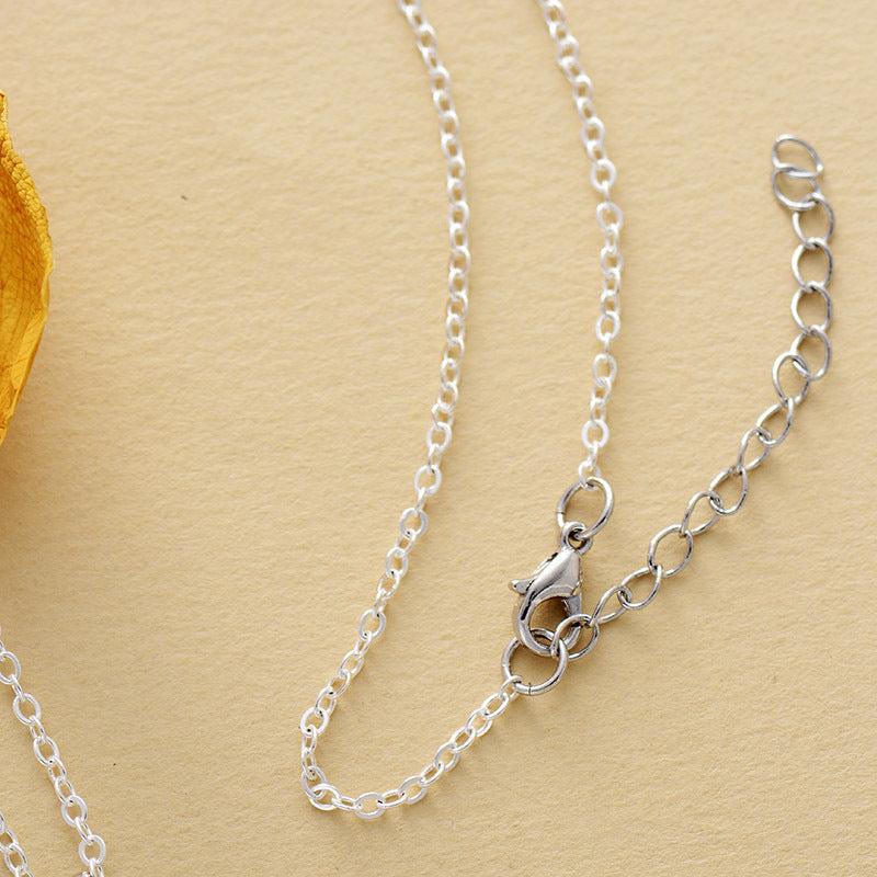 Halskette mit türkisfarbenem Kettenanhänger Zweitbild