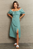 Perfee Swiss Dot Slit Off-Shoulder Dress - felvior