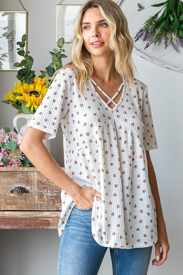 Heimish Full Size Crisscross Ditsy Floral Babydoll Top Plus Size - felvior