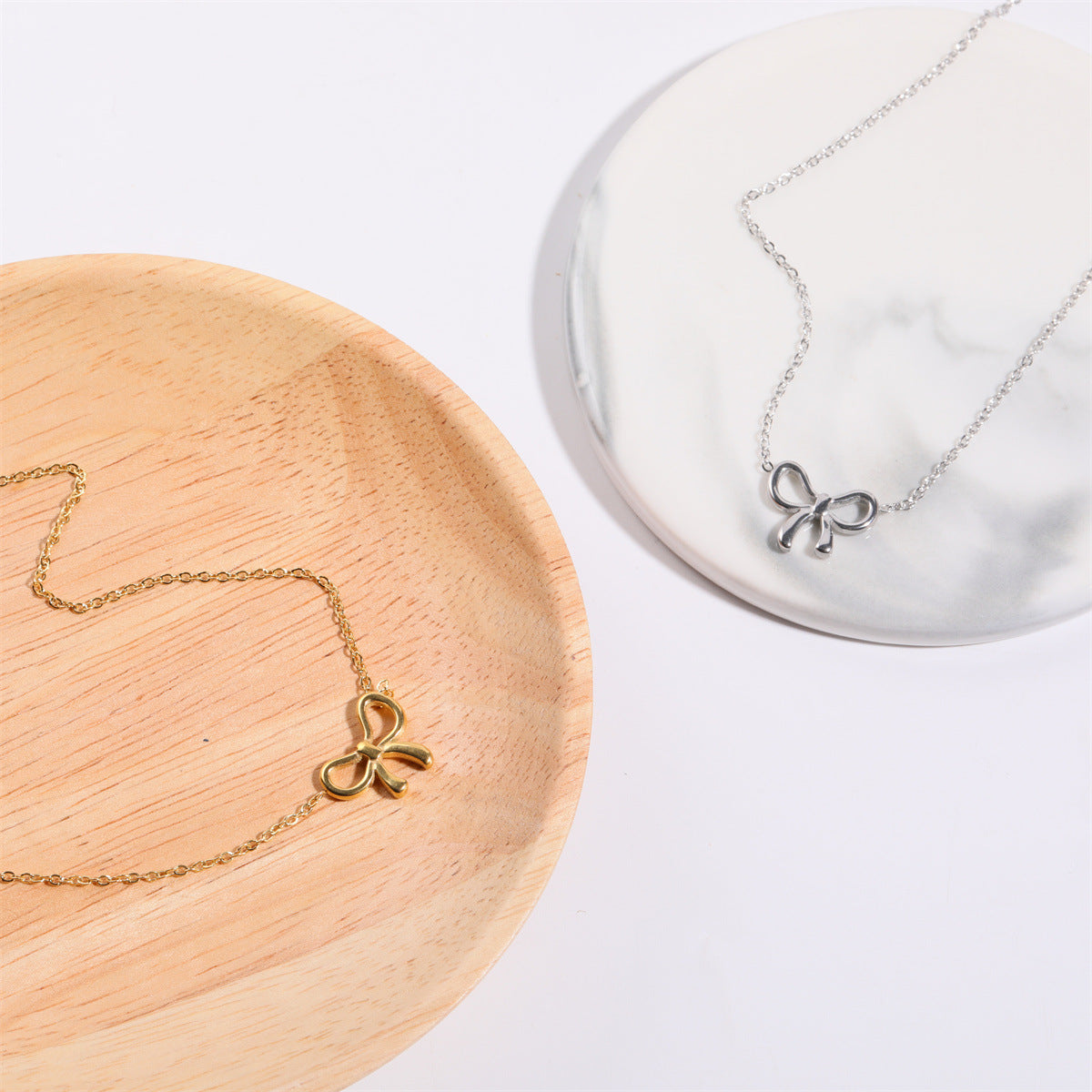Titanium Steel Bow Pendant Necklace - felvior