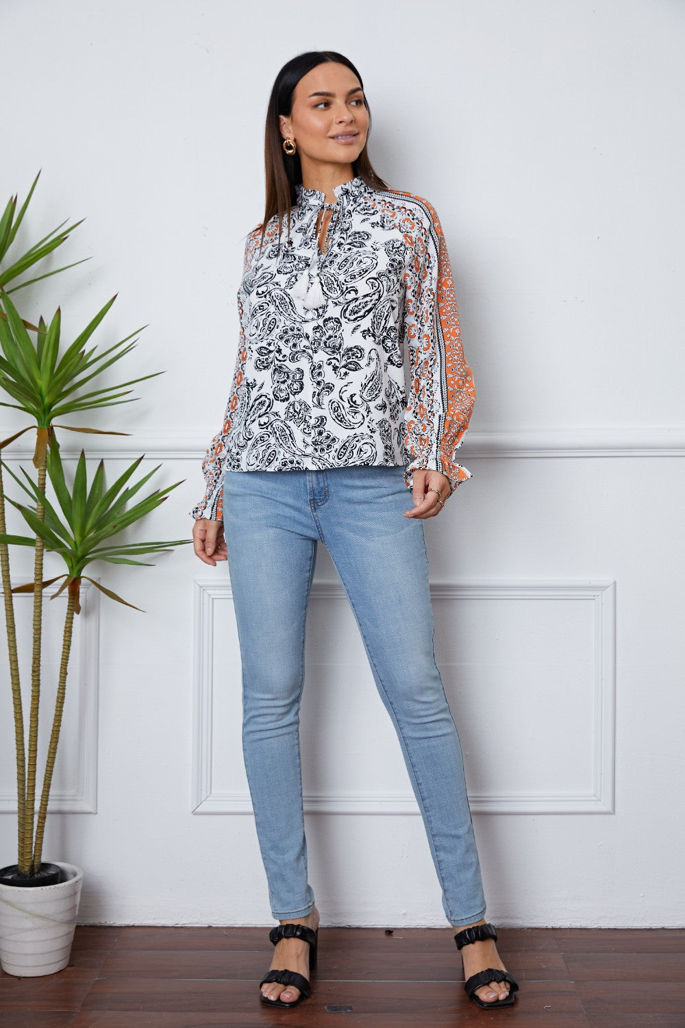 Tassel Tie Neck Printed Smocked Long Sleeve Blouse - felvior
