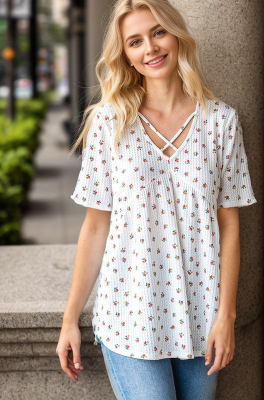 Heimish Full Size Crisscross Ditsy Floral Babydoll Top Plus Size - felvior