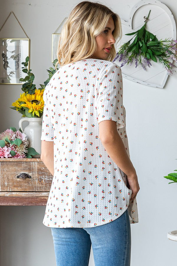 Heimish Full Size Crisscross Ditsy Floral Babydoll Top Plus Size - felvior